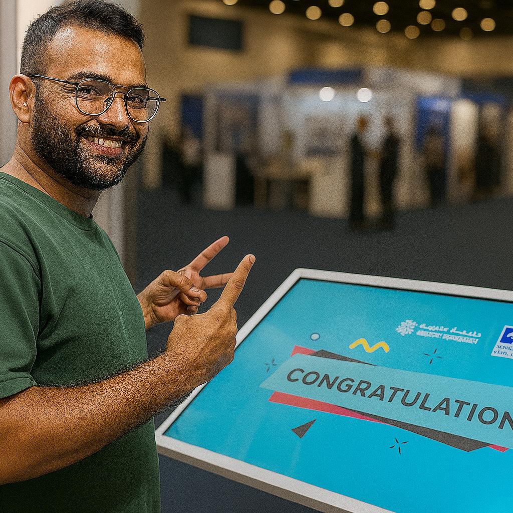 Guest solving a scrambled photo puzzle on a touchscreen at an event. Interactive image puzzle game rental for exhibitions, corporate events, and activations in Dubai.